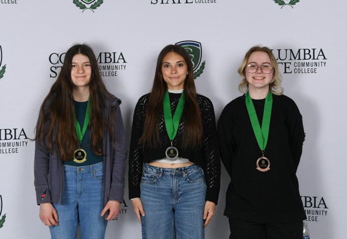 Psychology Winners (left to right): First place winner, Emma Guina of Summit High School; second place winner, Maecy Rosson of Loretto High School; and third place winner, Willow Mae Nyman of Loretto High School.