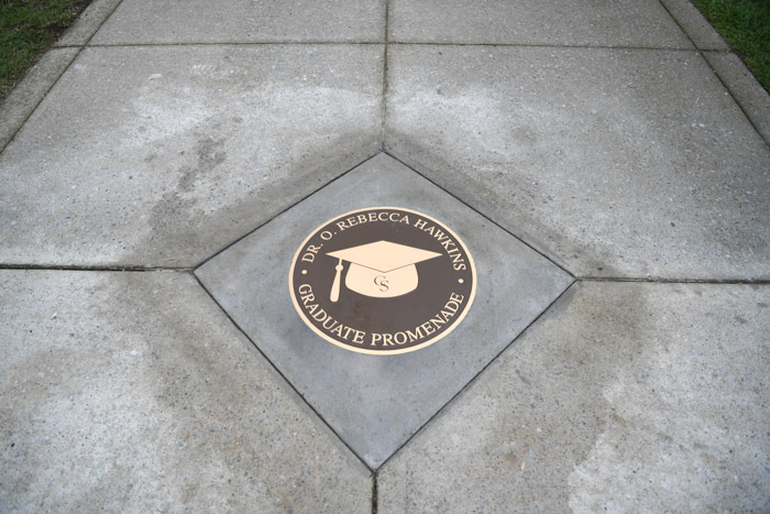 Medallions that will mark the newly named Dr. O. Rebecca Hawkins Graduate Promenade at Columbia State.