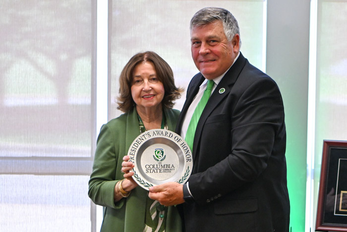 Dr. Janet F. Smith, Columbia State president, presents William "Sonny" Shackelford with the President’s Award of Honor for Distinguished Alumni.