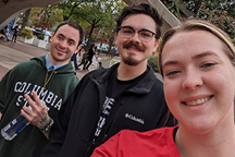 Three smiling students
